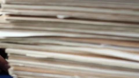 Male hand using computer - among lots of files Stock Footage 53516830