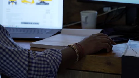 Male hand using mouse at desk with computer in background Stock Footage 202119852