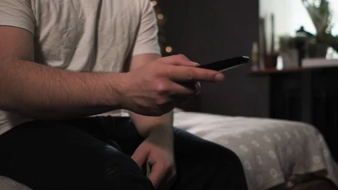 Male hand using TV remote Stock-Footage 126111372