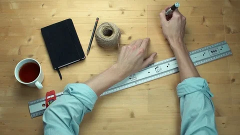 Male hand writing maths formulas math symbols at plastic glass with black marker Stock Footage 82900276