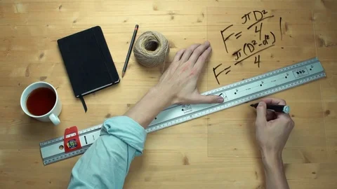 Male hand writing maths formulas math symbols at plastic glass with black marker Stock Footage 82900593