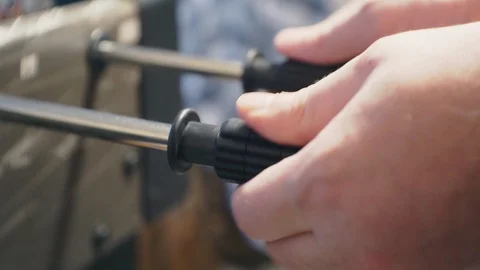 Male hands actively move the table football or kicker control knobs 库存影片 124927082