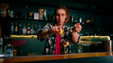 https://images.pond5.com/male-hands-bartender-rub-peel-footage-240451899_iconl.jpeg