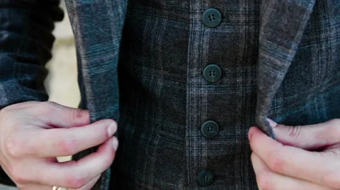 Male hands buttoned jacket Stock Footage 55185431