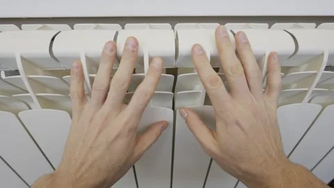 Male Hands Checking Temperature On White Central Heating Radiator In Home Stock Footage 329403110