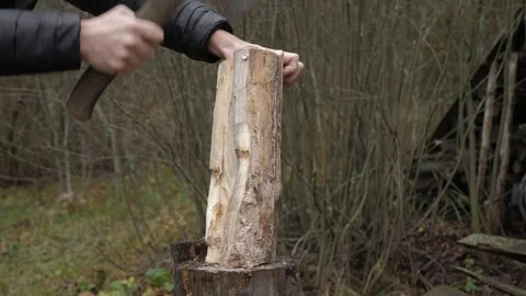 Male hands chopping log Stock Footage 342867849