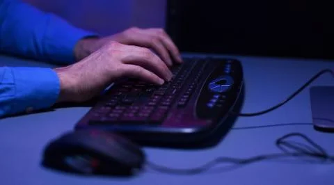 Male Hands On Computer Keyboard, Programmer Coding Indoor At Night 写真素材