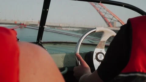 Male hands control the boat Stock Footage 156642876