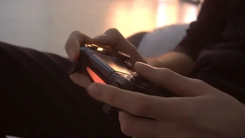 Male hands control a gamepad Stock Footage 116687611