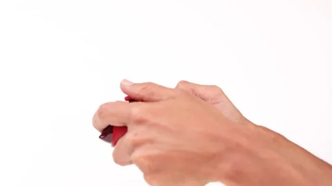 Male Hands on a controller playing video games isolated on white Stock Footage 240607555