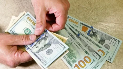 Male hands count one hundred dollar bills. Stock Footage 269694755