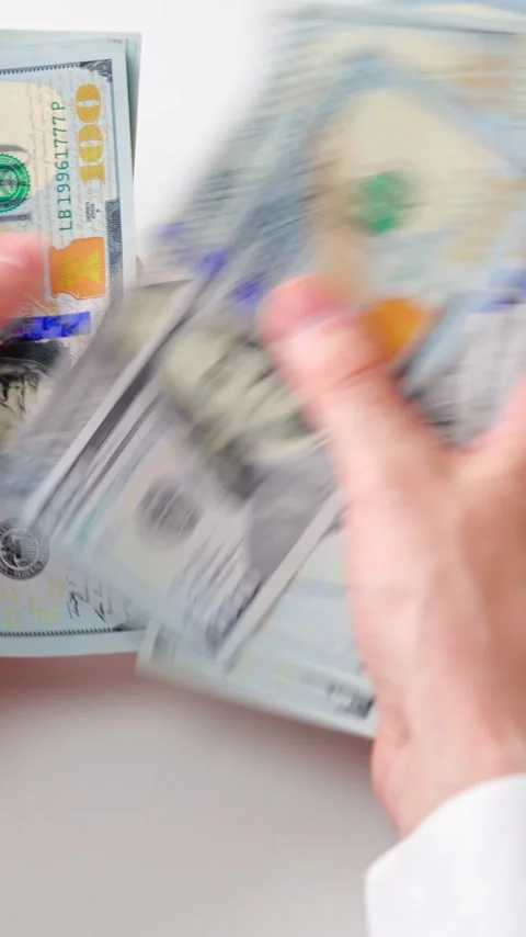 Male hands counting US Dollar bills, close-up Video stock 340407804