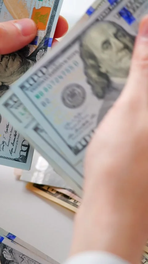Male hands counting US Dollar bills, close-up Video stock 340407845