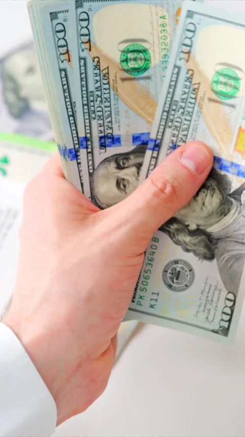 Male hands counting US Dollar bills, close-up Video stock 342835566