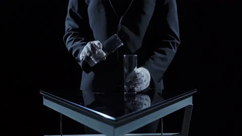 Male hands with empty glasses make different movements on a dark background 動画素材 201855815