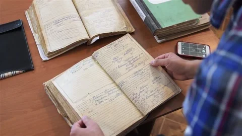 Male hands flipping documents in administration 스톡 동영상 150253025
