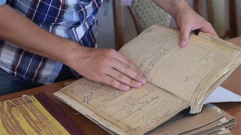 Male hands flipping documents in administration 스톡 동영상 150253132