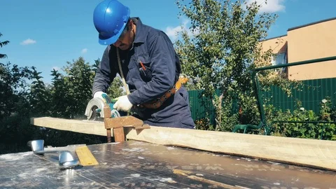 Male hands in gloves work with jack-plan Stock Footage 99110179