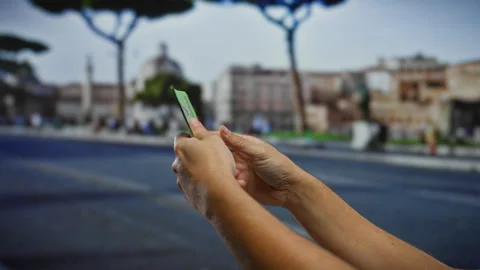 Male hands holding malaysian ringgit banknotes on a city street, conveying .. Stock-Footage 301125233