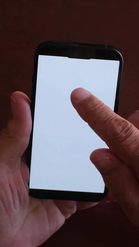 Male hands holding a smartphone while scrolling through a photo gallery Stock Footage 344396445