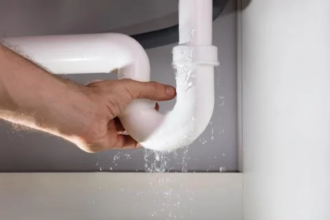 Male Hand's Holding The White Sink Stock Photos
