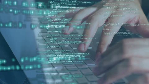 Male hands hovering then settling on keyboard, initiating typing and coding with Stockbeeldmateriaal 335316718