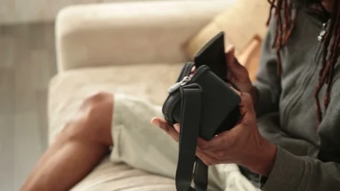 Male hands inserting mobile phone into VR glasses Stock Footage 73889957