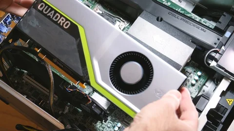 Male hands installing powerful Nvidia Quadro GPU in Dell Workstation Stock Footage 103339591