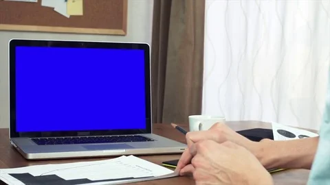 Male hands making note with pencil at printed analyzing graphs Stock Footage 81879240