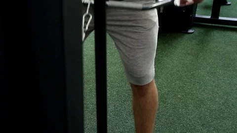 Male hands perform an exercise on the simulator Stock Footage 114638347