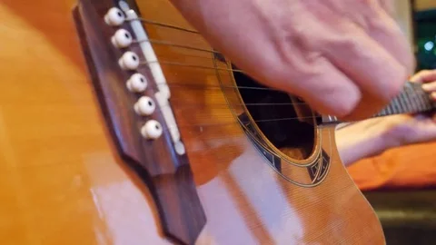 Male hands playing classic guitar Stock Footage