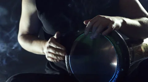 Male hands playing on darbuka, slow rhythm Stock Footage 59643237