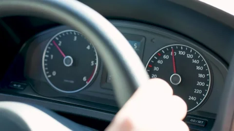 Male hands on the steering wheel of a car, close-up Stock Footage 270481253