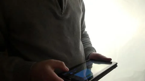 Male hands with tablet computer, indoors Stock Footage 20149164