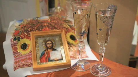 Male hands take the wedding glasses from the table Stock Footage