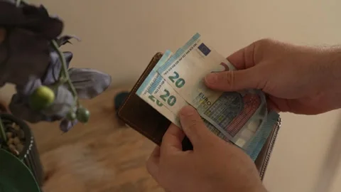 Male Hands Taking Three Twenty Euro Notes Out Of Leather Wallet Stock Footage 345319314