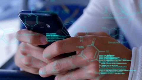Male hands tapping phone screen causing scrolling code and molecules zooming and Stock-Footage 335283046