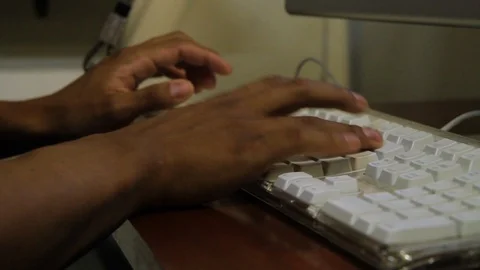 Male Hands Type on Keyboard - Dark Skin Tone Stock Footage 99754928