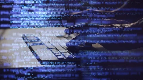 Male hands types program code on keyboard. Blue source code overlay. Code and Stock Footage 126037714