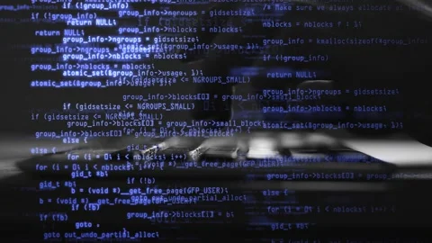 Male hands types program code on keyboard. Blue source code overlay. Code and Stock Footage 132517591