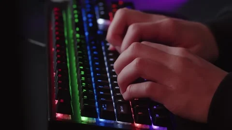 Male hands is typing on the computer keyboard, close up view. Fast typing o.. Stock Footage 254623786