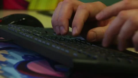 Male hands typing on computer keyboard close up Stock Footage 297216862