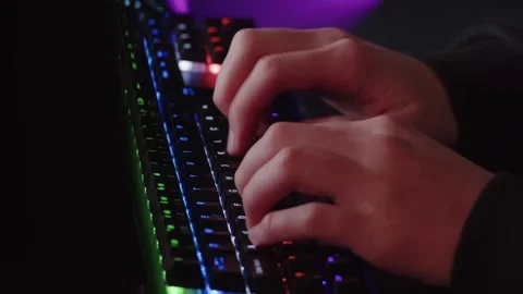 Male hands is typing on the computer keyboard, close up view. Fast typing o.. Stock Footage 302920573