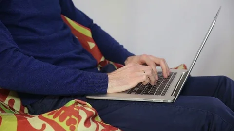 Male hands typing on the keyboard Stock Footage 69986519