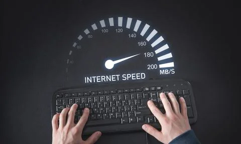 Male hands typing in keyboard. Speedometer. Internet speed Stock Photos
