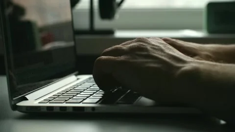 Male hands typing on laptop keyboard Stock Footage 337828309