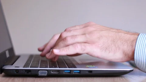 Male hands typing on notebook close up Stock Footage 92410351