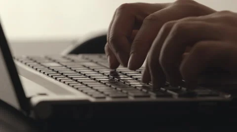 Male hands typing on a notebook Vídeo Stock 66786627