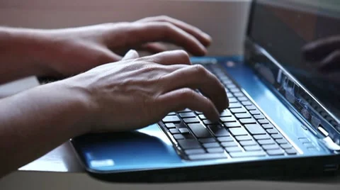 Male hands typing on notebook keyboard Stock Footage 8664871