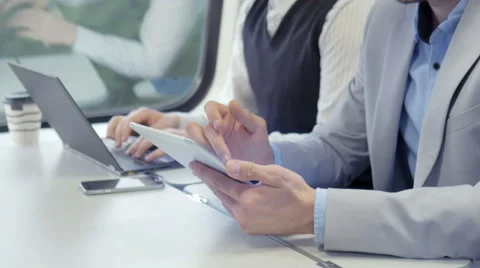 Male hands using digital devices on daily commute on the train Stock Footage 67261916